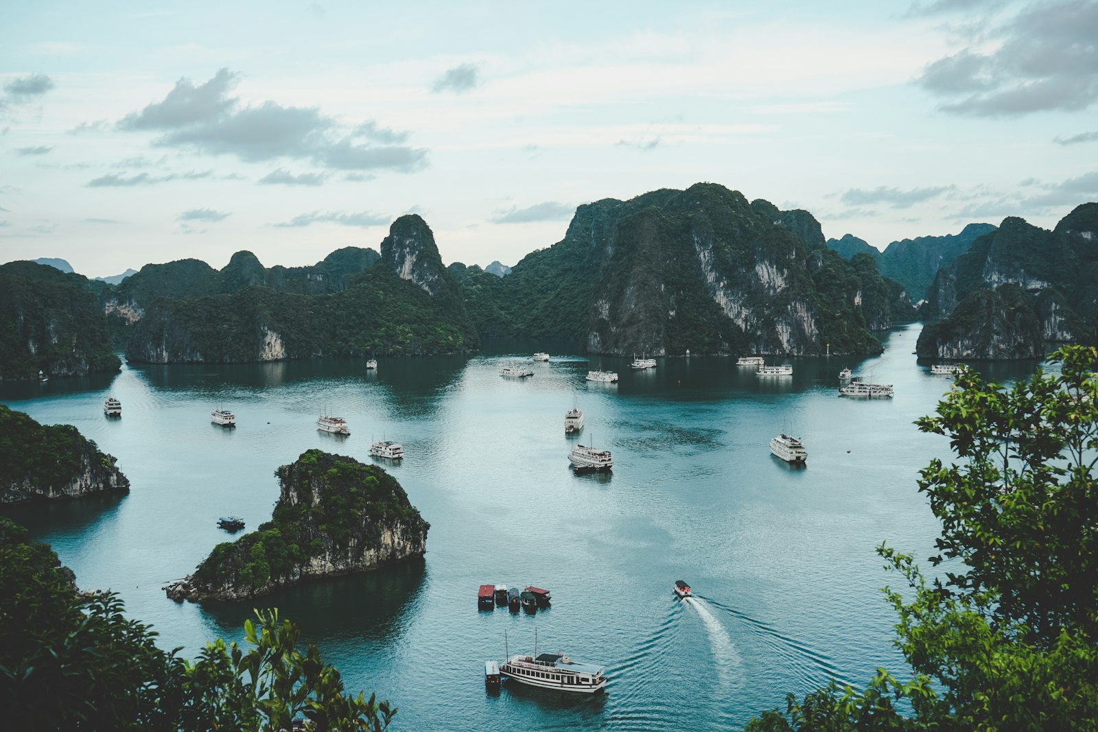 Limestone karsts and junk boats in Halong Bay, Vietnam